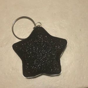 It can be used in the hand or with its strap.